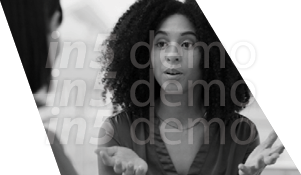 A woman with a laptop on her lap. Description generated by AI